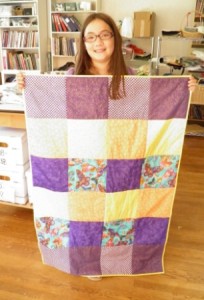 First quilt by young sewing student