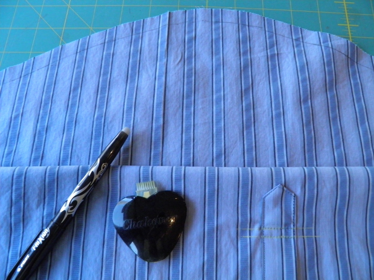 Fabric marking tools shown on shirt sleeve